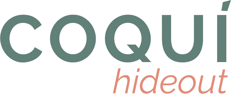 Wordmark logo design Coquí Hideout Botique Vacation Rental created by Visible PR, clean typography with hideout in terracotta accent color